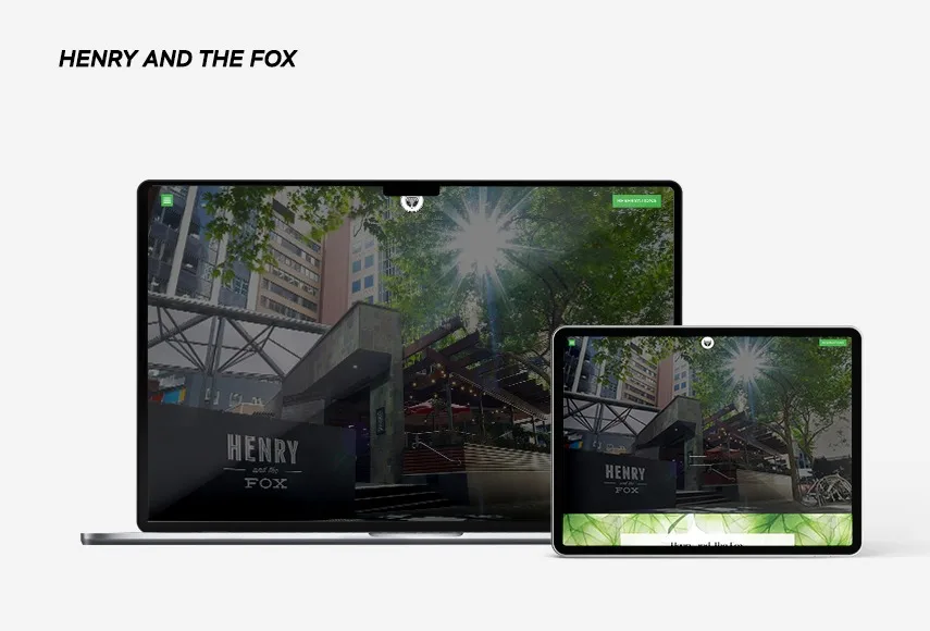 Website design for Henry and the Fox, shown on laptop and tablet.